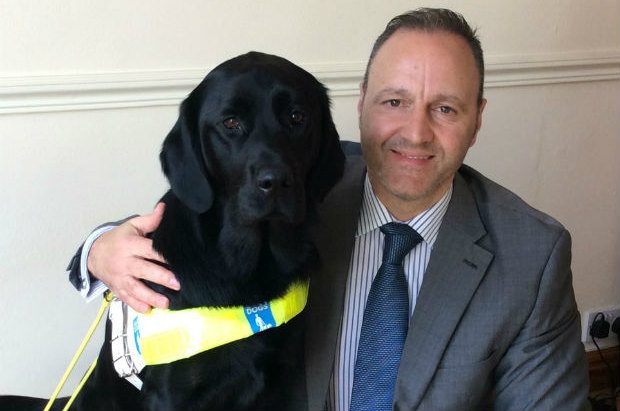 Steven and his guide dog Questa