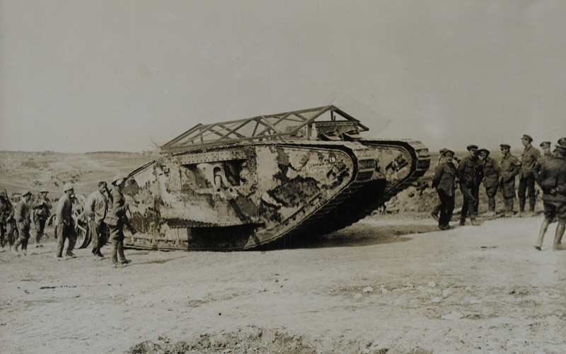 Photograph of troops with tank