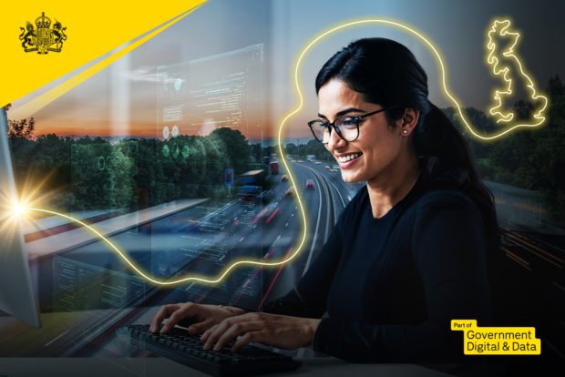 Person in front of computer with image in the background of roads