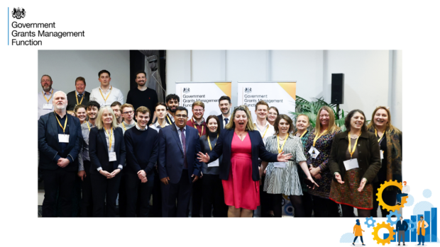 Group photo of member of the government grants management function celebrating their 200k user of find a grant at the government grants conference in Birmingham