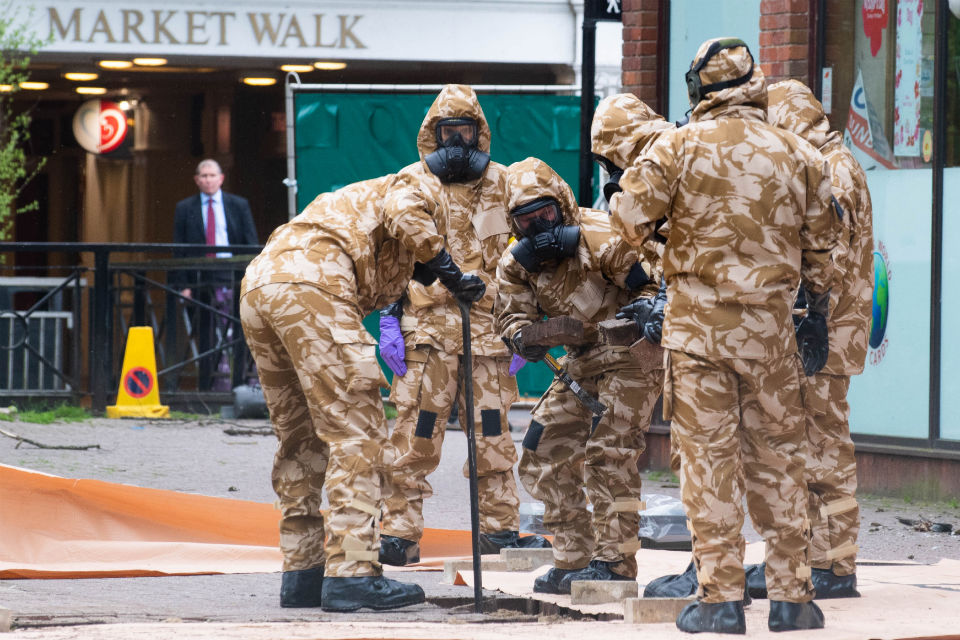 Military personnel in protective gear