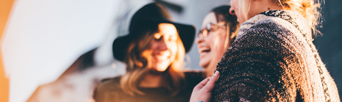 3 women laughing 