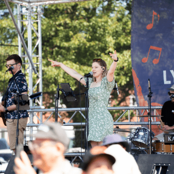 Live band performing on stage at Lymington Seafood Festival 