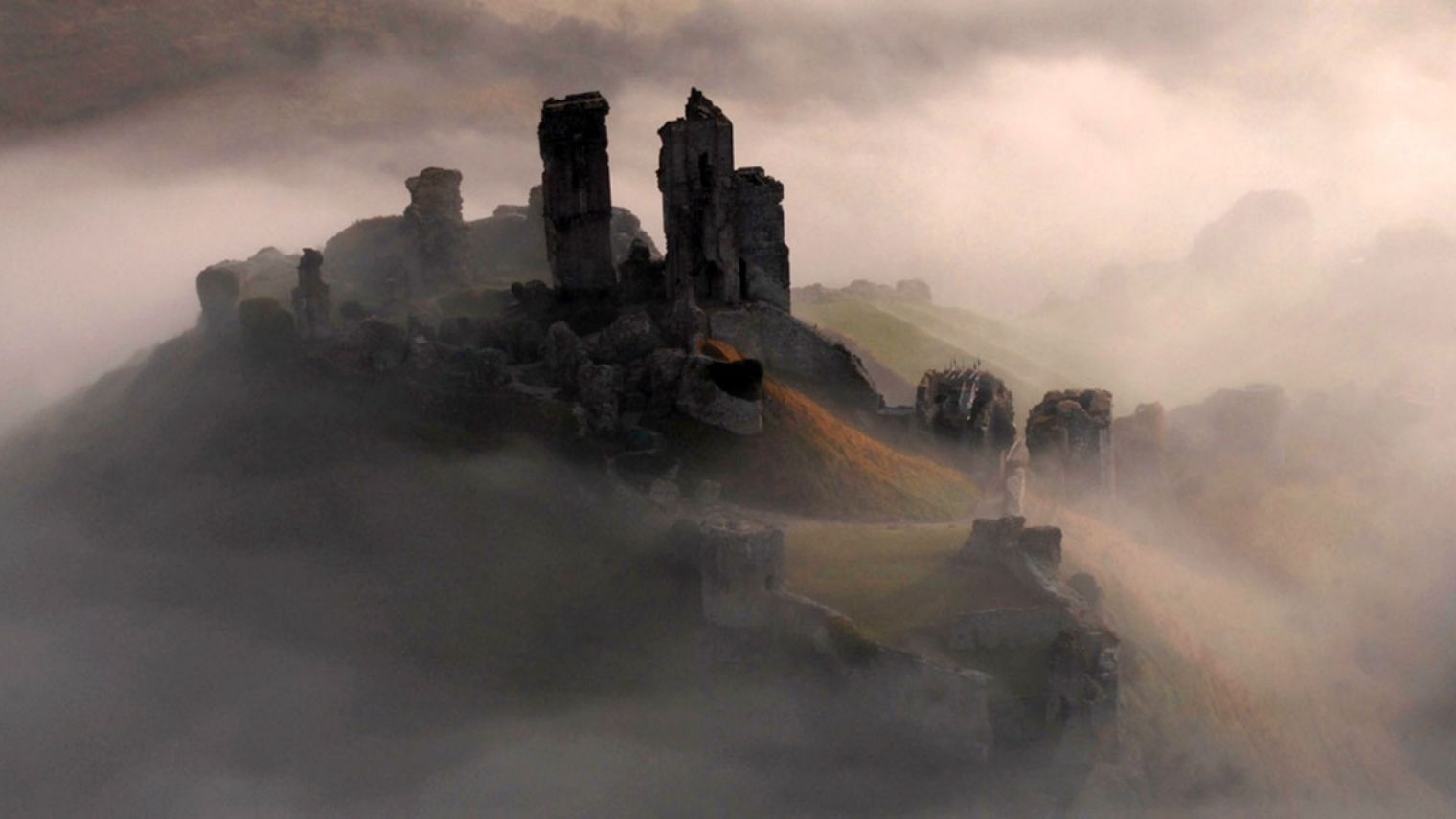 Corfe Castle seen in low cloud