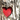 A tree with a red love heart on it