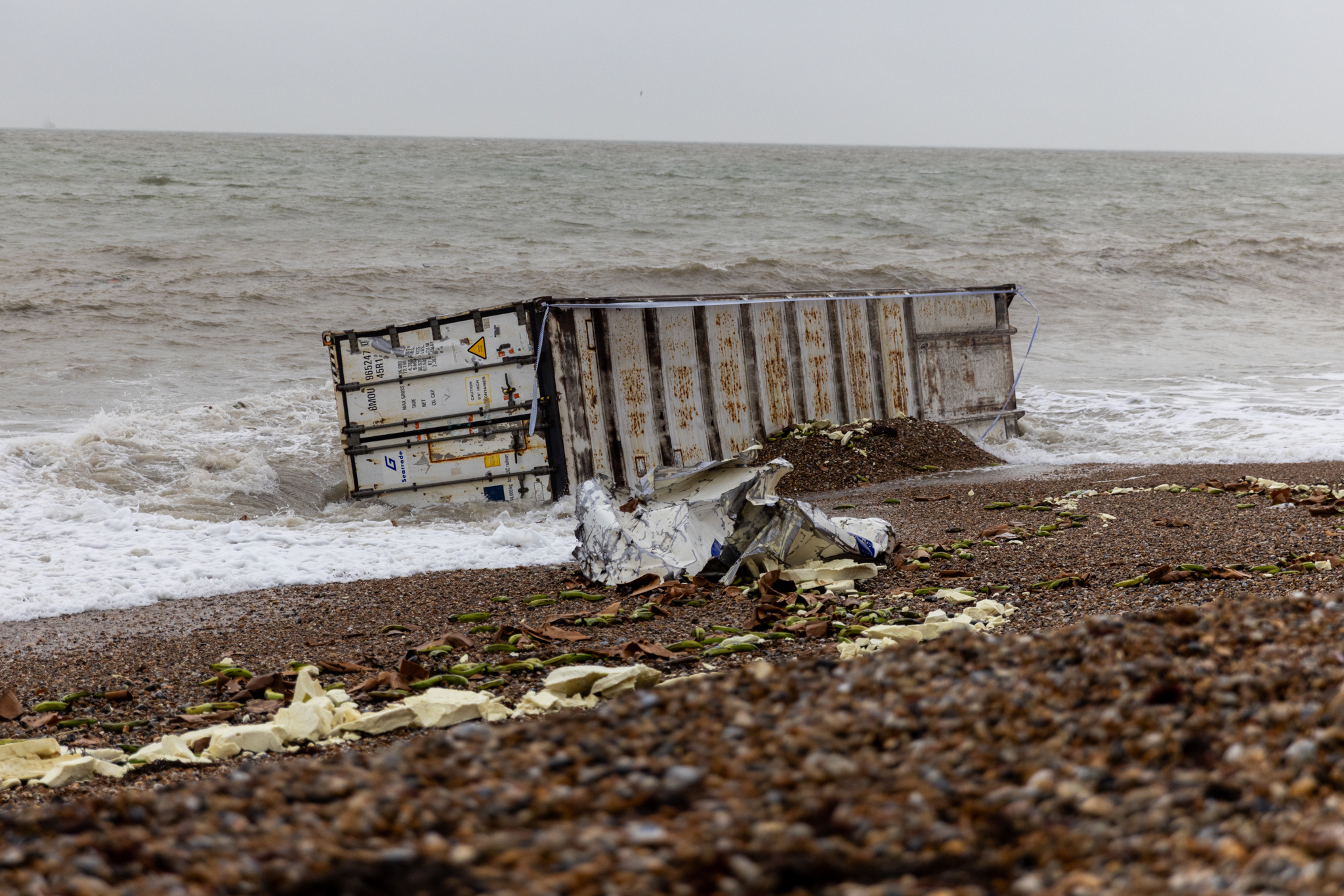 Containers washed on shore at Selsey, Sussex.
