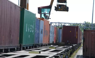 Rail freight wagons being loaded at a freight yard
