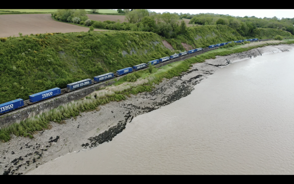 Aerial shot of tesco freight train.
