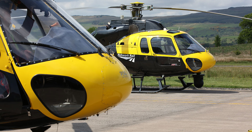 How does the Network Rail helicopter reduce delays?