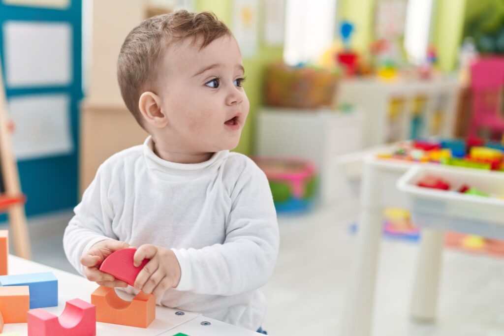 Young child playing with blocks