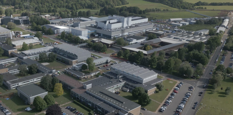 An aerial view of the Joint European Torus buildings. A group of industrial buildings surrounded by green fields.