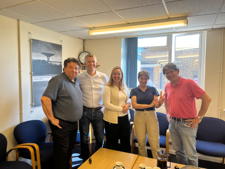 The teams from RAL Space, Telesat and ESA celebrating the successful achievement.