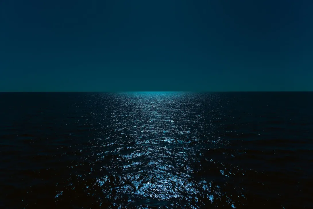 Dark blue sky and ocean