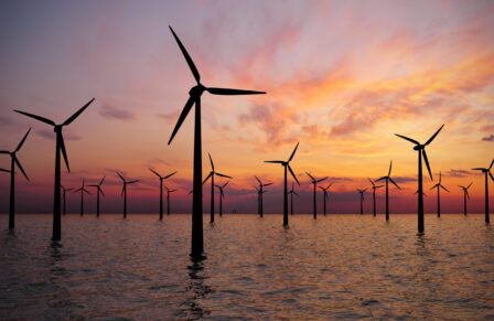 Offshore,Wind,Turbines,Farm,At,Sunset