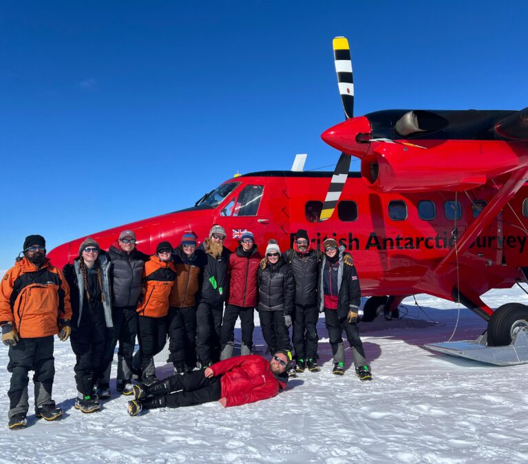A group of people that are standing in the snow