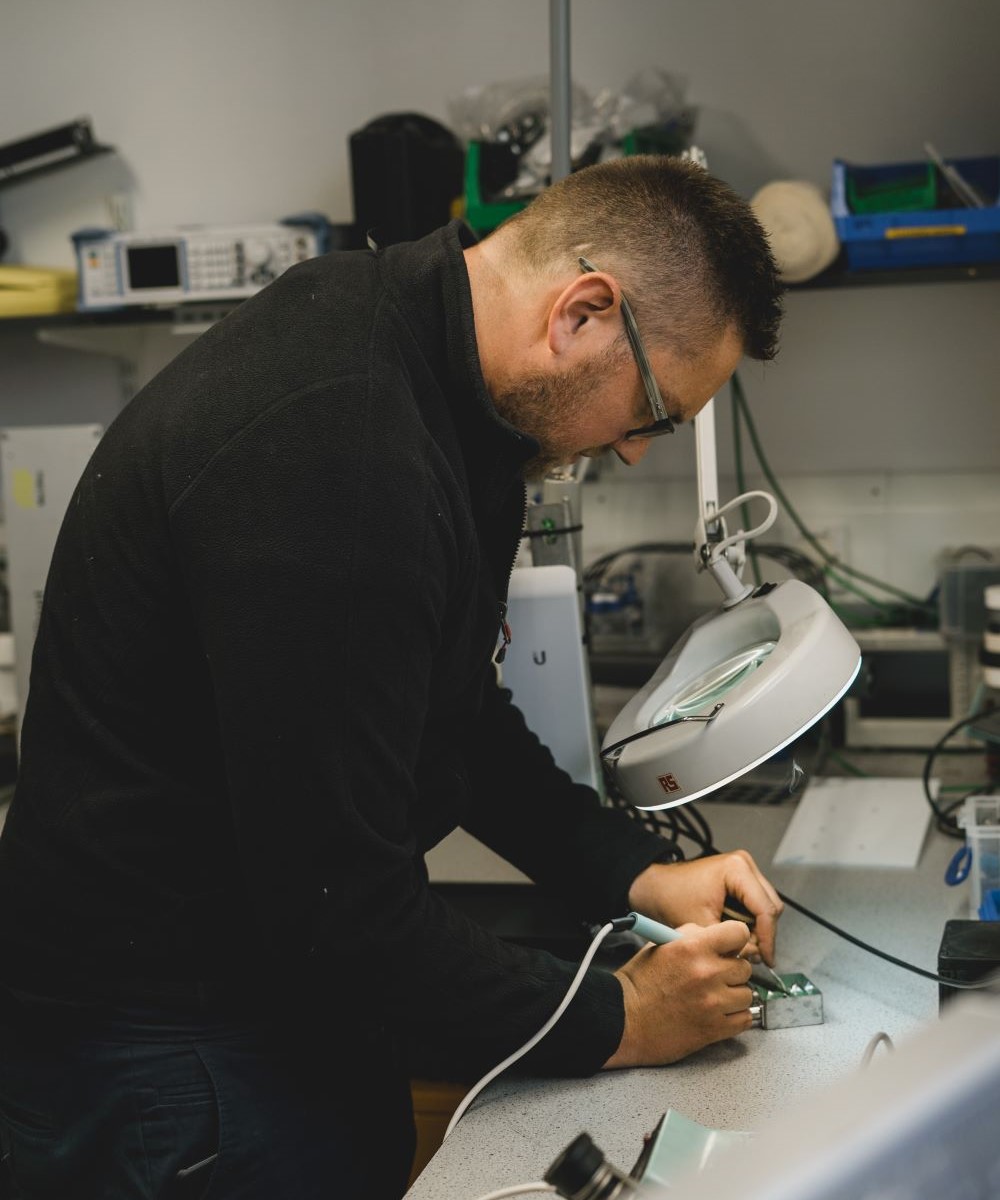 Man fixing object.jpg