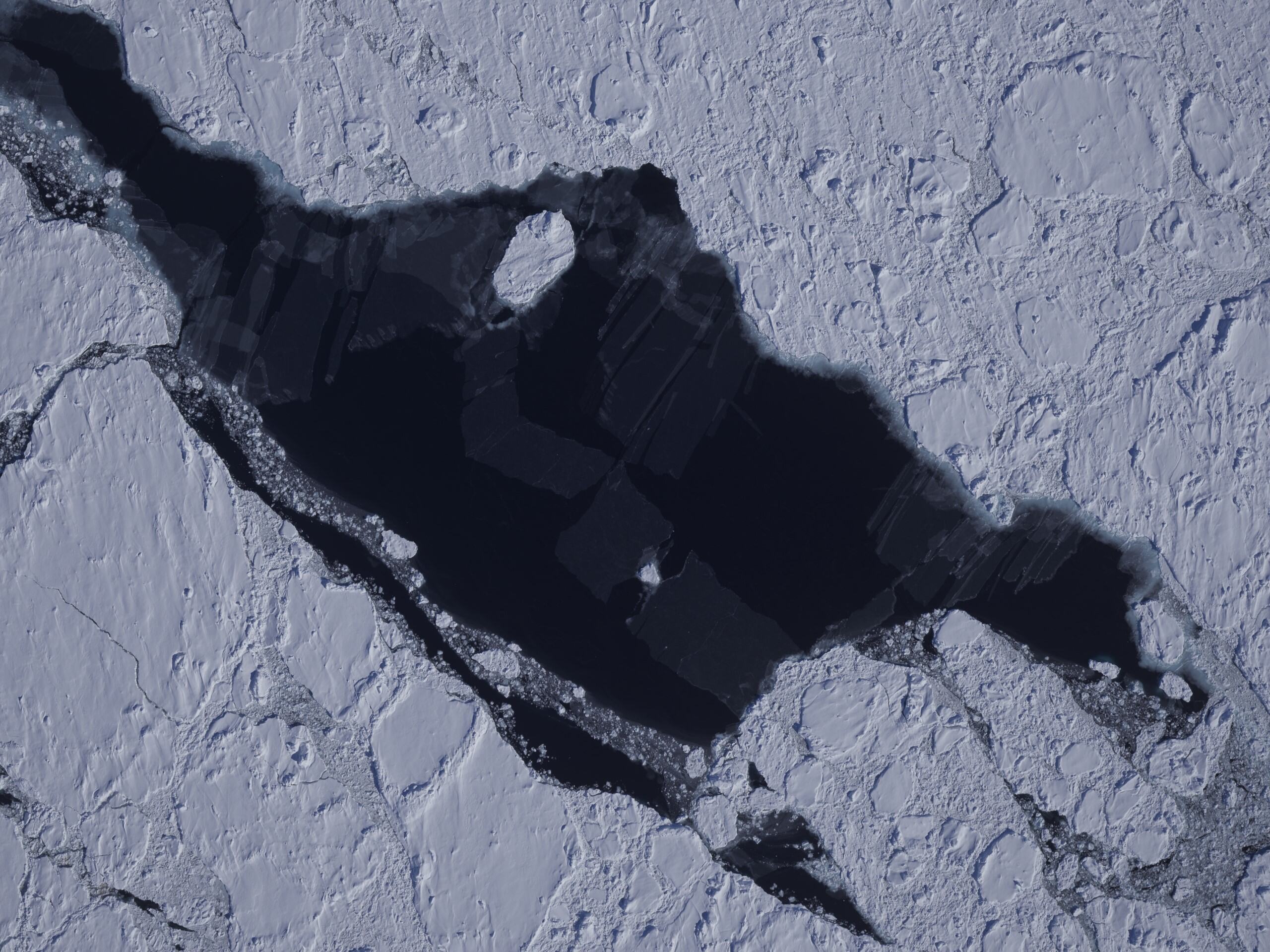 A close up of a snow covered slope