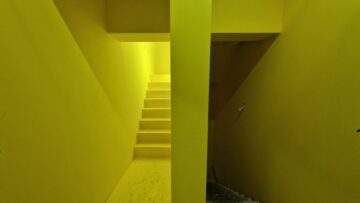 A stairwell and doorway inside a building
