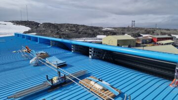 The side of a bright blue building
