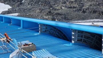 Part of a bright blue building