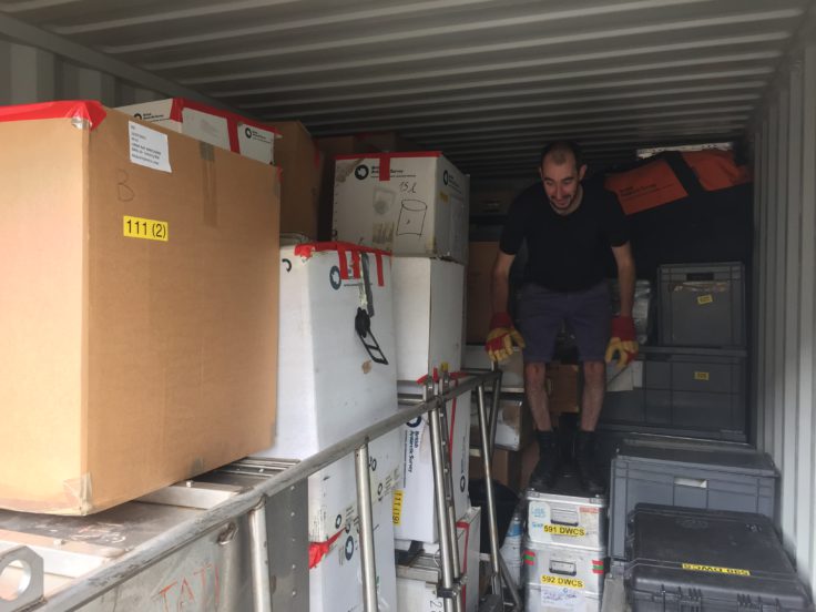 Oliver Hogg packing equipment on a sunny day in Cambridge in 2015