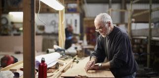 Man doing woodwork in his workshop