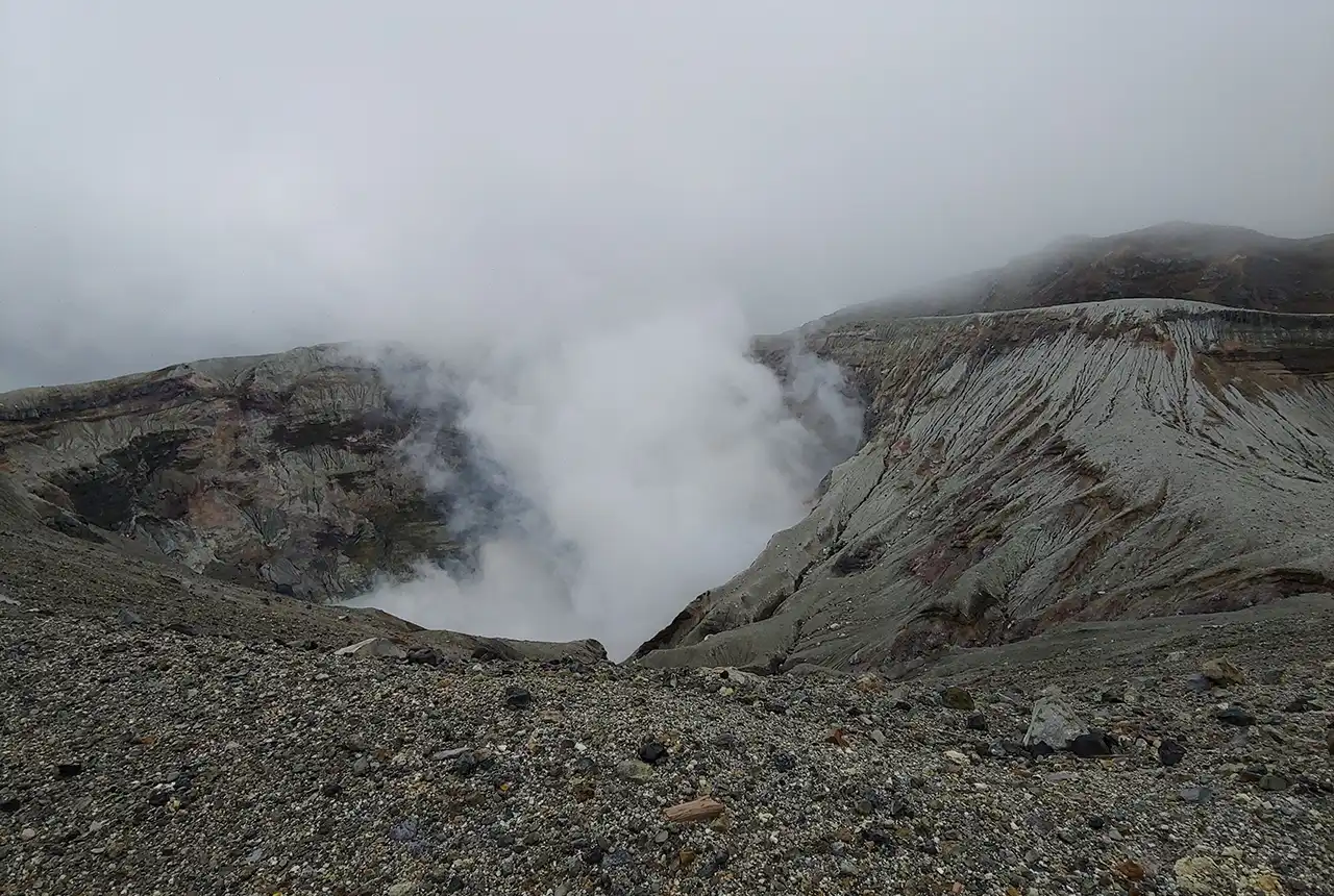 Steam clouds rising from the crater lake, which is one of the most active volcanic areas in the world.BGS © UKRI. BGS © UKRI.