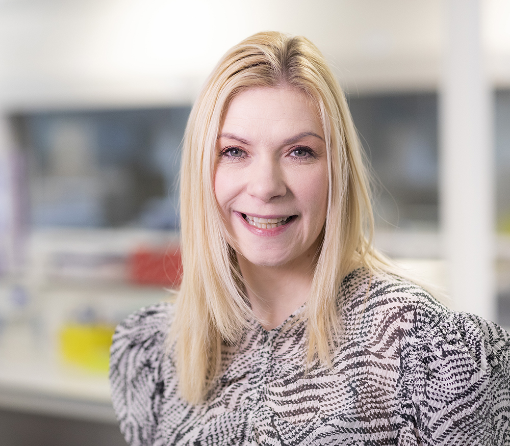 A photo of Dr Juliana Maynard, de-risking radiopharmaceutical investment using her preclinical imaging expertise at Medicines Discovery Catapult.