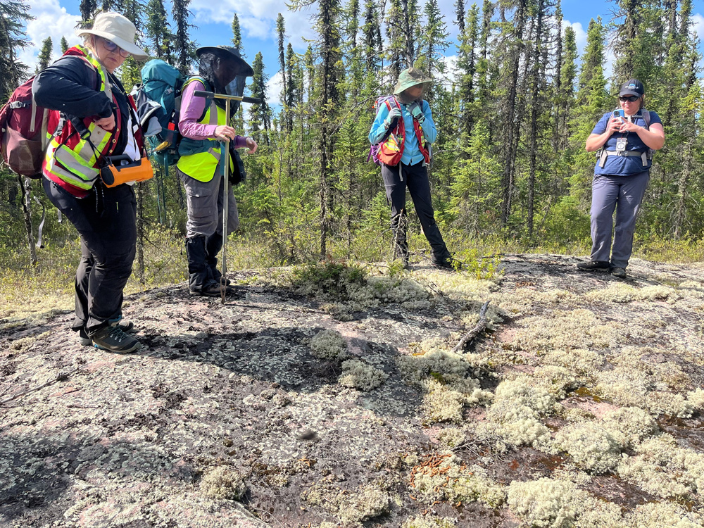 Claudia, Eimear, Camille and Christine, standing on the Palaeoproterozoic rocks of the Wollaston Group at Fraser Lakes, northern Saskatchewan.