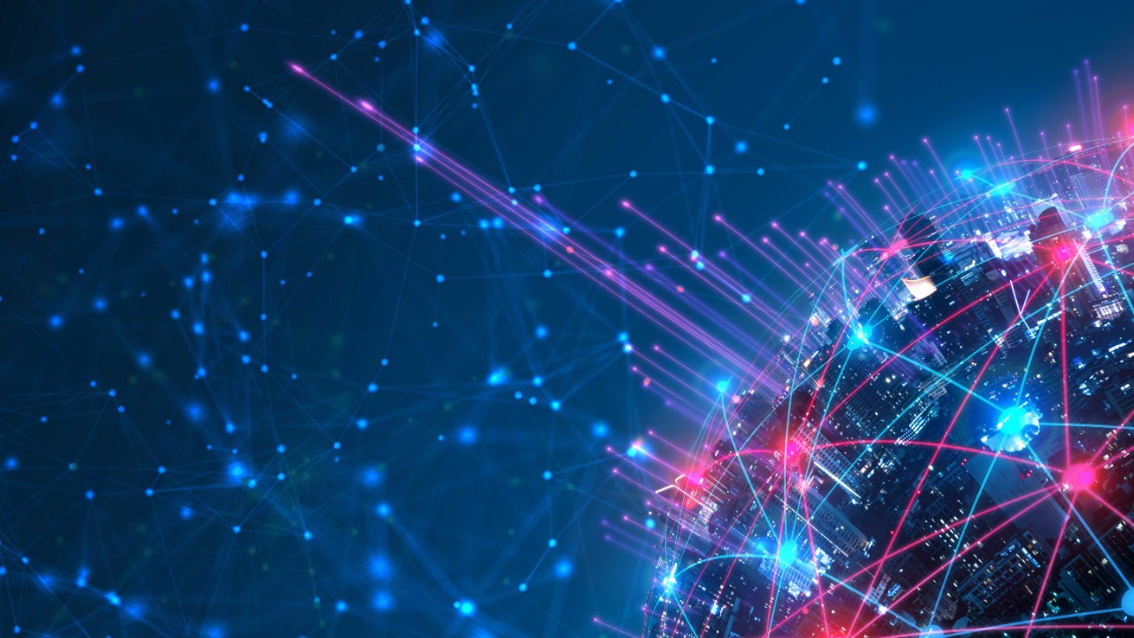 A digital globe with neon lights and network lines, representing global connectivity against a dark blue background. - CSA Catapult