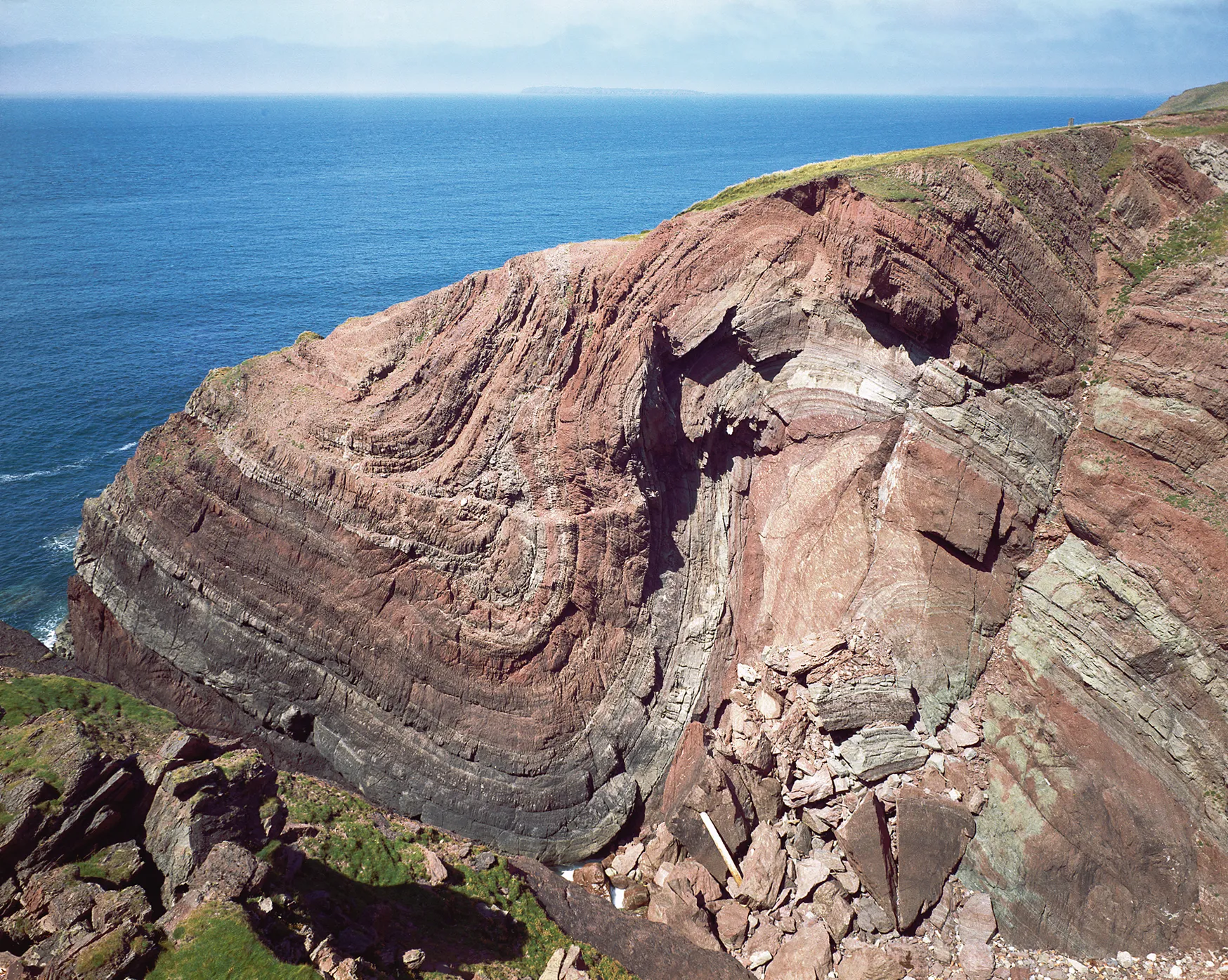 Folds in a cliff of red sandstone