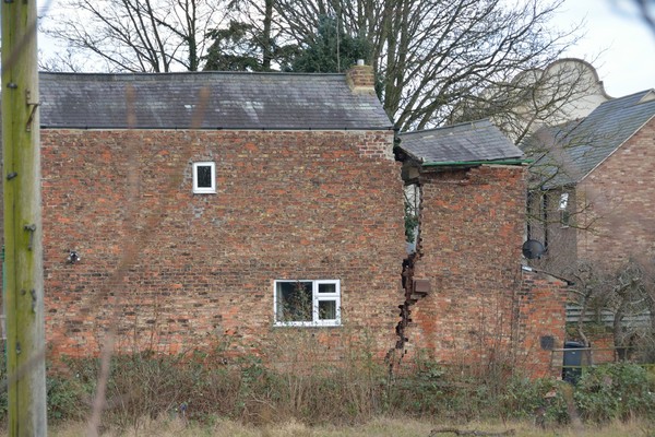 Damage caused to No 26 Magdalen’s Close by sinkhole that developed on Monday 17 February 2014.