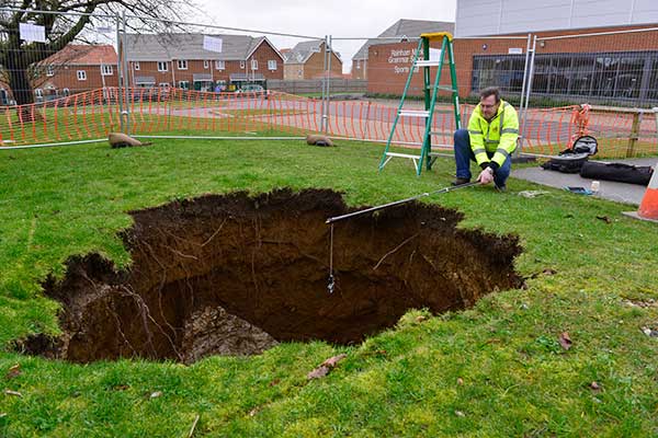Rainham Mark Grammar School: surface expression of denehole collapse that occurred on 12 February 2014.
