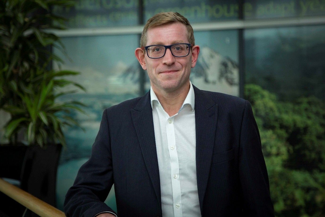 A corporate headshot of Simon Brown, Met Office Services Director.