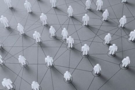 Illustration of connected figures representing members of an advisory committee network.
