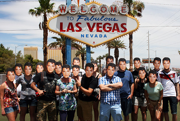 Mask-arade Elvis masks being warn by a group of people in Las Vegas