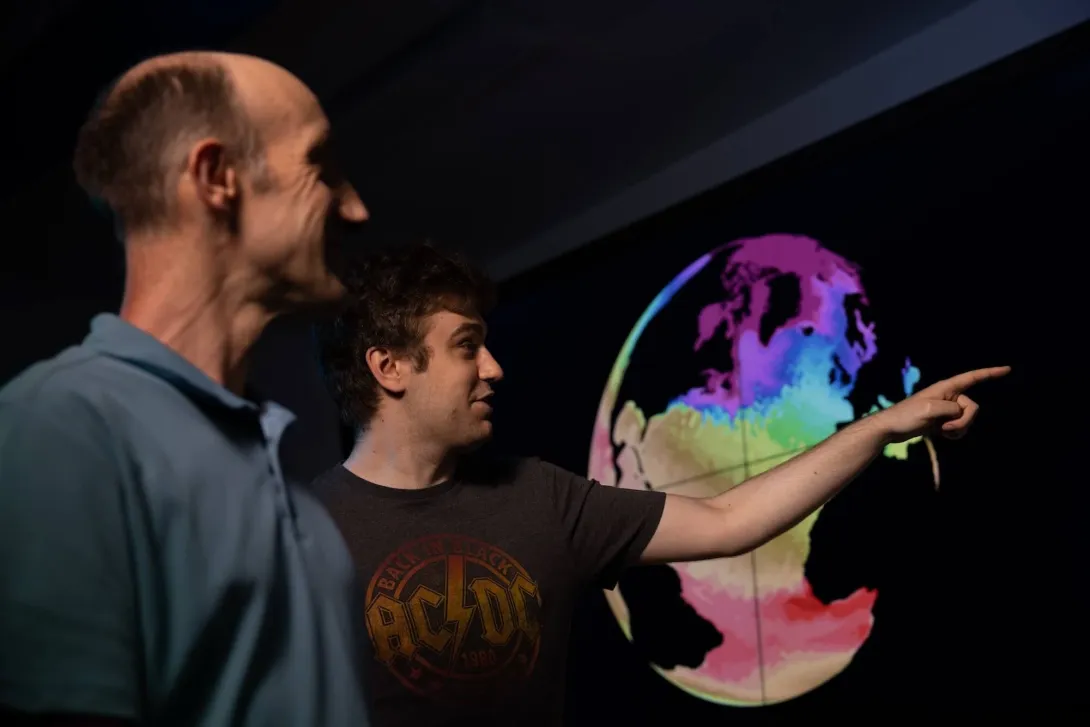 Modelling team viewing a map projection