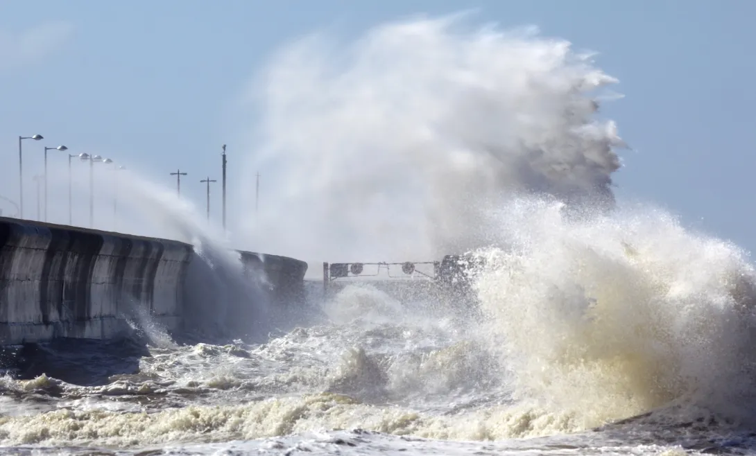Wave hitting a sea defence