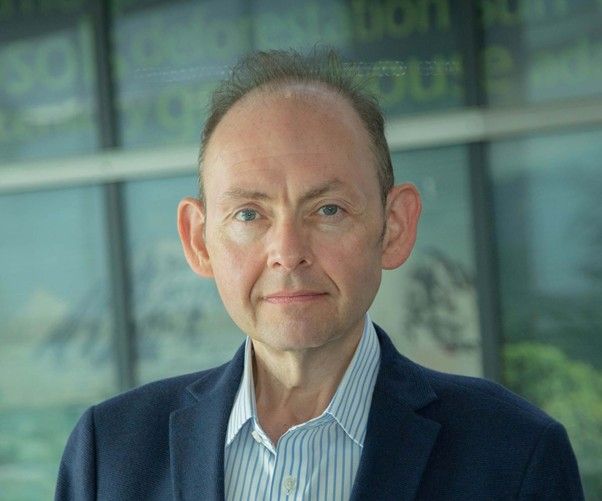 Corporate headshot of Jordan Giddings, Met Office Non Executive Director