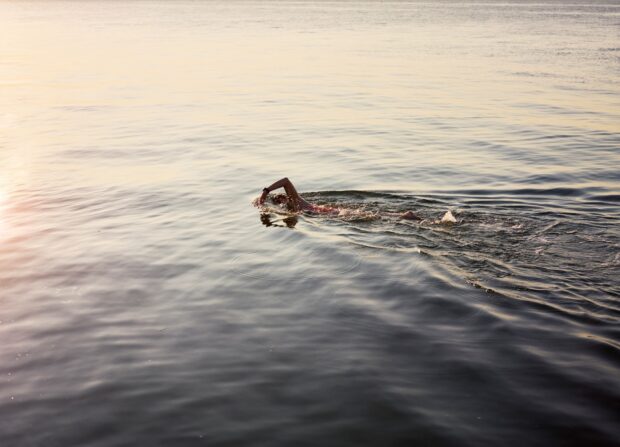 Person swimming in open water