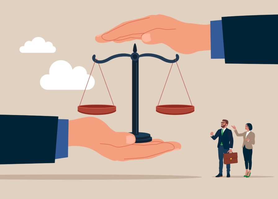 A balanced scales of justice, protected by two hands.