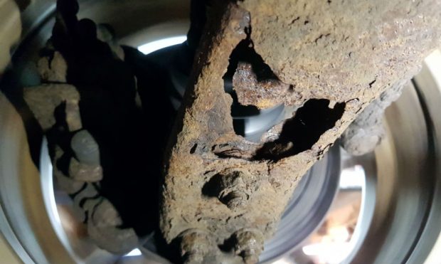 Corroded suspension lower arm