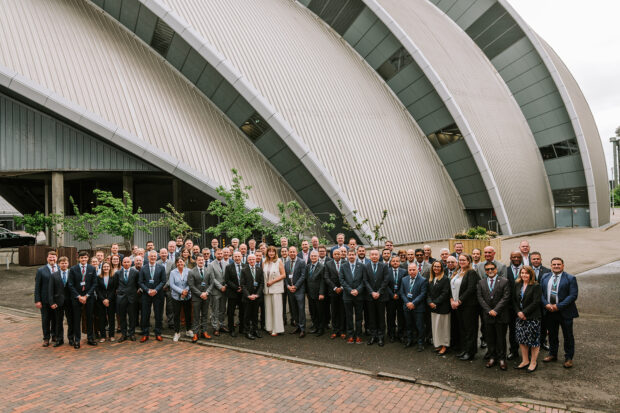 Paris MoU meeting attendees gather in a group outside the SEC Armadillo in Glasgow