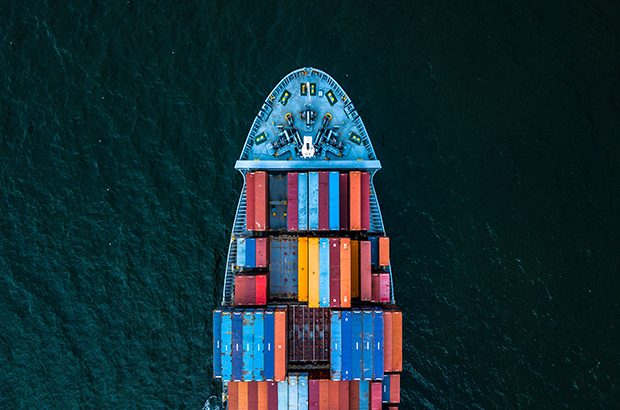 Birdseye view of a shipping container at sea.
