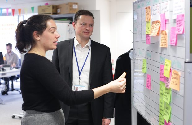 Adrian Atley and Alice Carter at a kanban