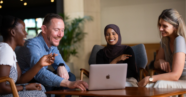 Photo of digital professionals collaborating in the office