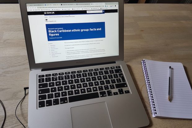 A laptop showing the report home page
