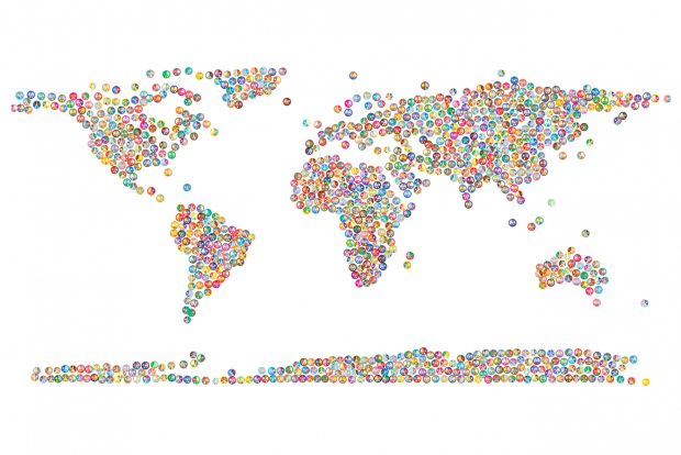 The world map made with rainbow coloured peace signs