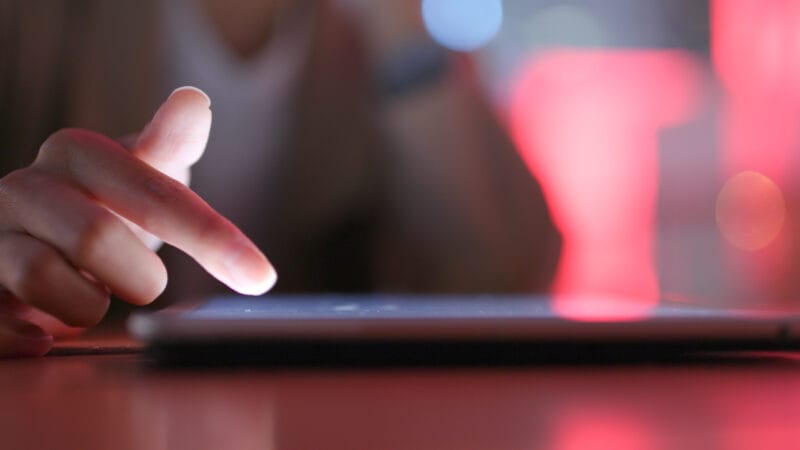 A person using a tablet computer