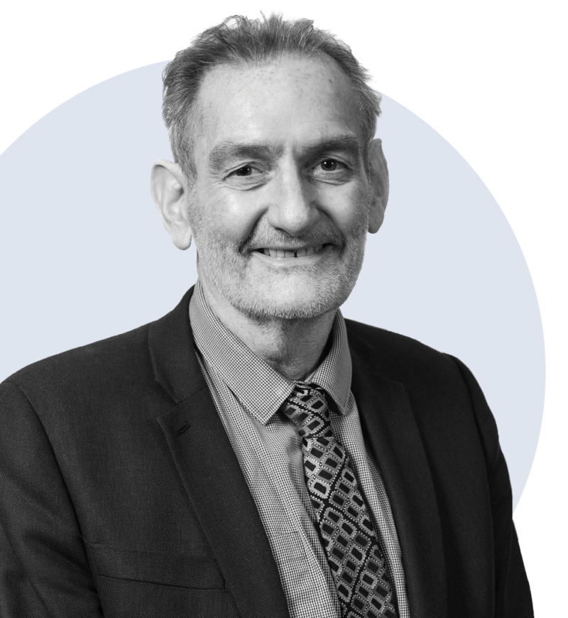 Photographic portrait of Sir Ian Diamond cut out and set on a solid circle background